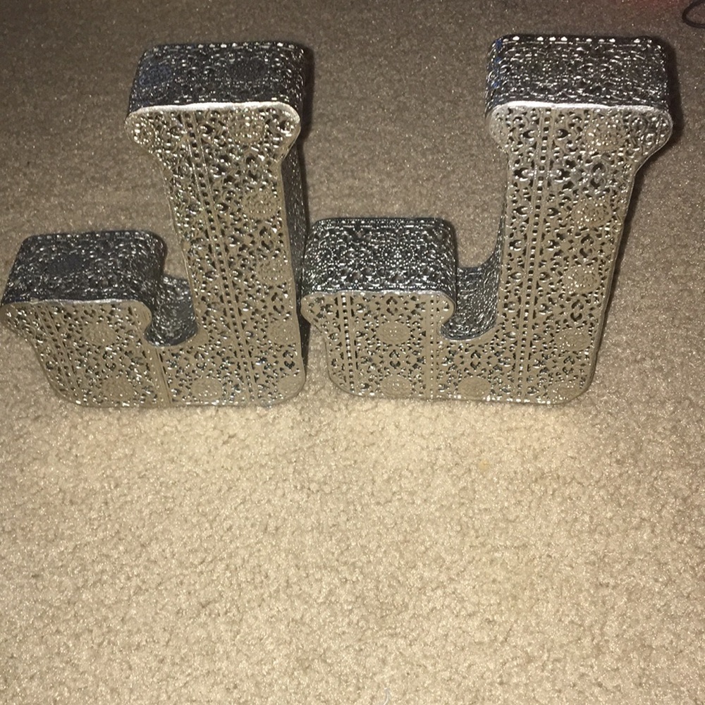 Silver lever J's.